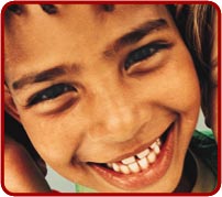 photo: a close-up photo of a young boy smiling