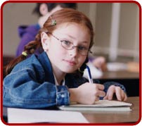 photo: close-up photo of a young girl wearing wireframe glasses