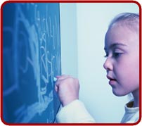 photo: young girl doing math on a chalk board